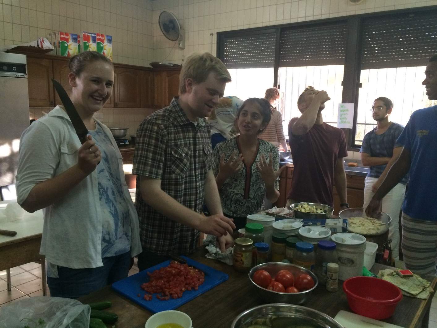 An informal evening and an Arabic cooking class as the students prepare an Iftar dinner during Ramadan in the ACOR kitchen. Photo Georgetown. 