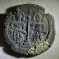 Arab-Byzantine coin from a coin hoard found in a house destroyed by an earthquake in Gerasa. Photo courtesy of the Danish-German Northwest Quarter Project, 2014